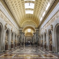 Wander through the spectacular halls of the Vatican Museums filled with artistic masterpieces 