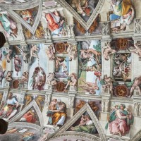 Look up in wonder at Michelangelo's achievement in the Sistine Chapel
