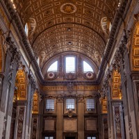 Explore incredible St. Peter's basilica and gaze up at Bernini's enormous bronze baldachin